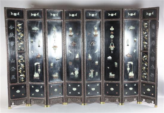 A good Chinese jade, hardstone and rosewood mounted eight fold Coromandel lacquer screen, 19th/20th century, Each panel W.1ft 2in. H.6f